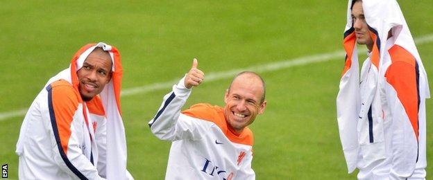 Netherlands players (left to right) Nigel de Jong, Arjen Robben and Wesley Sneijder