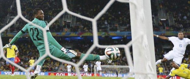 Honduras forward Carlos Costly scores to put his side in front against Ecuador