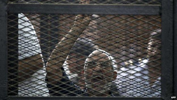 File photo: Egyptian Muslim Brotherhood leader Mohammed Badie gesturing as he shouts from inside the defendants cage during his trial in the capital Cairo, 7 June 2014