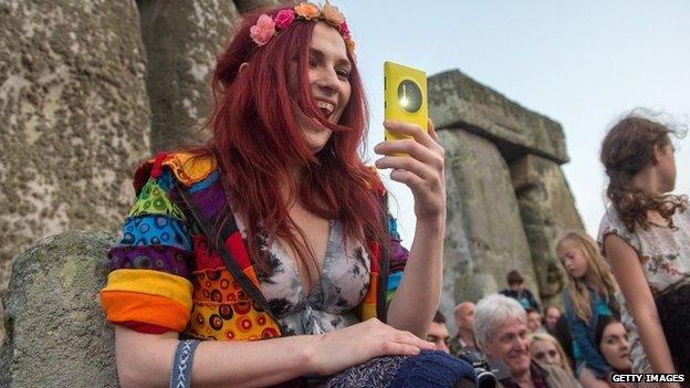 People prepare for the summer solstice dawn celebrations