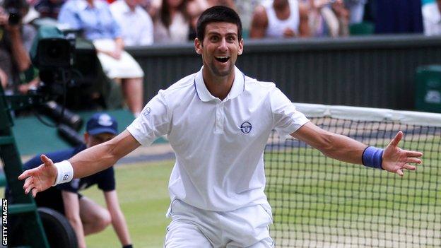 Novak Djokovic of Serbia celebrates championship point after winning Wimbledon.