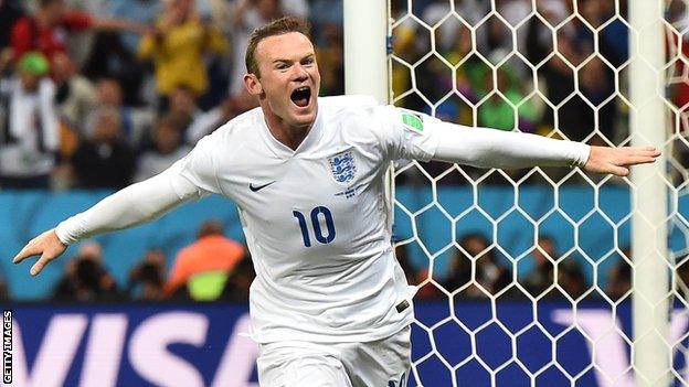 Wayne Rooney celebrates equalising against Uruguay