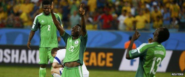 Nigeria players Kenneth Omeruo (C) and Juwon Oshaniwa (R)