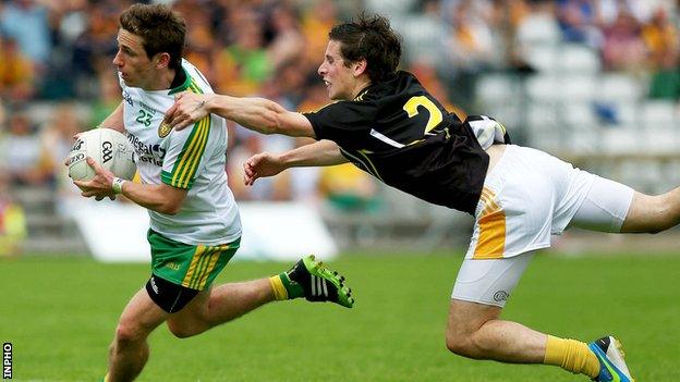 Darach O'Connor bursts past Antrim's Kevin O'Boyle at Clones