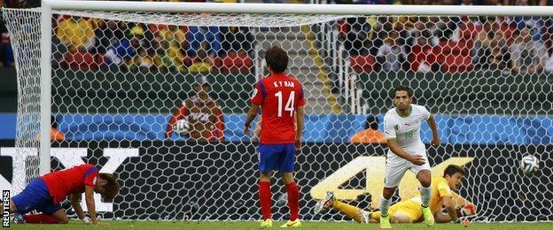 Algeria forward Abdelmoumene Djabou scores for his side against South Korea