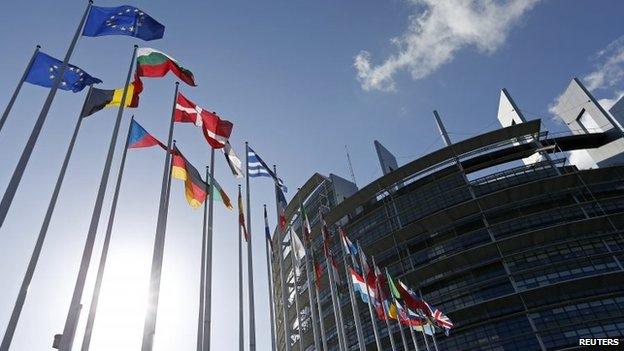 Flags of European Union member states fly in front of the European Parliament building in Strasbourg, 15 April 2014