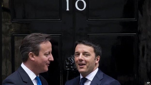 File photo: British Prime Minister David Cameron, left, greets Italy's Prime Minister Matteo Renzi before their meeting at 10 Downing Street in London, 1 April 2014