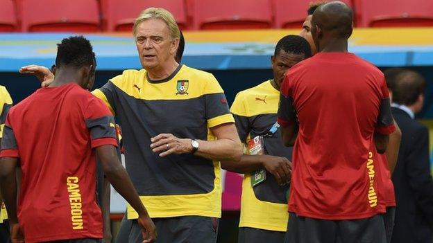 Cameroon coach Volker Finke (centre) gives out instructions during training