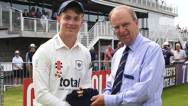 Patrick Grieshaber receives his cap from honorary treasurer Tony Elgood