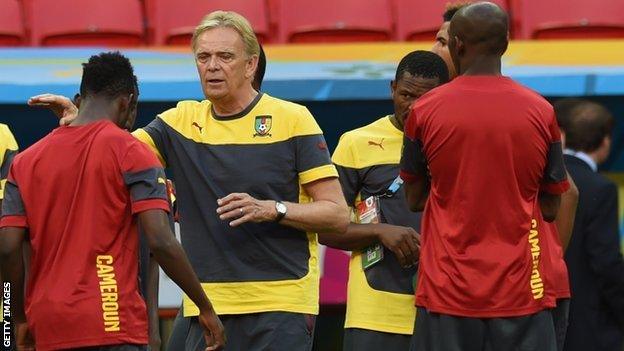 Cameroon coach Volker Finke (centre) gives out instructions during training