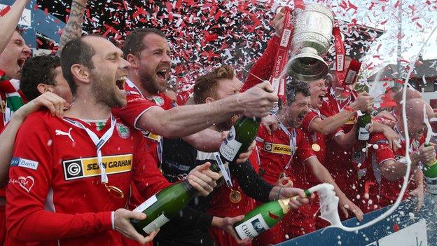 Cliftonville retained the Irish Premiership for the first time in 2014