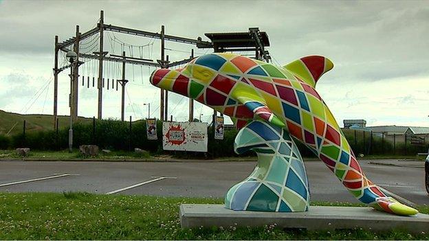 dolphin sculptures in aberdeen