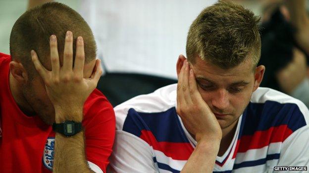 Dejected England fans