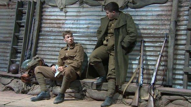 Soldiers in the trenches in the play Mametz