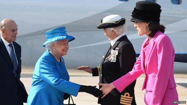 The Queen and Prince Philip are greeted by Secretary of State Theresa Villiers and Dame Mary Peters