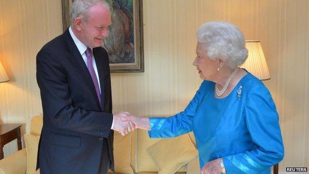 Martin McGuinness shaking hands with the Queen