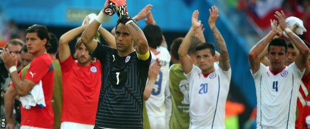 Chile's players applaud their fans after their first defeat of the tournament