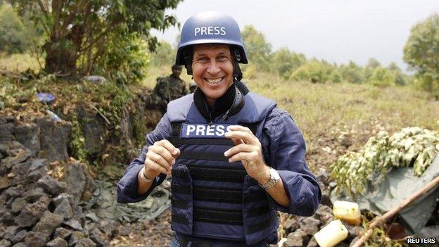 Peter Greste poses for a photograph while reporting for al-Jazeera in the Democratic Republic of Congo - 7 August 2013