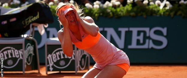 Maria Sharapova celebrates winning the French Open 2014