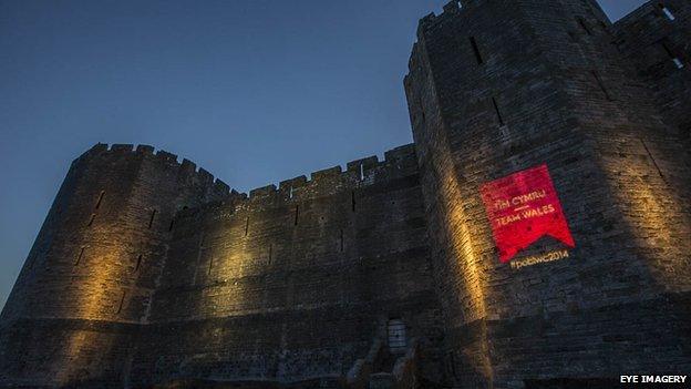 The red logo was projected on to castles around Wales