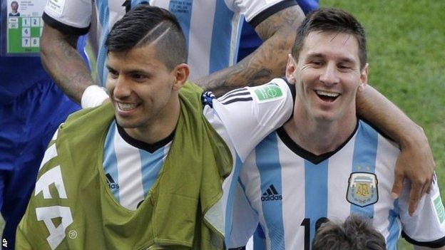 Argentina's Lionel Messi, right, with team-mate Sergio Aguero