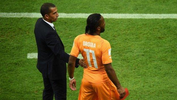 Sabri Lamouchi and Didier Drogba