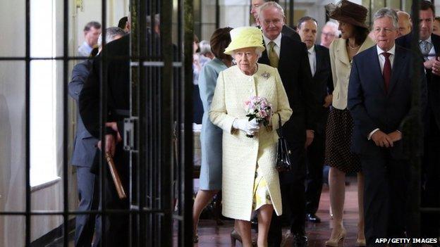 The Queen and Prince Philip were accompanied on a tour of C wing by Mr Robinson and Mr McGuinness