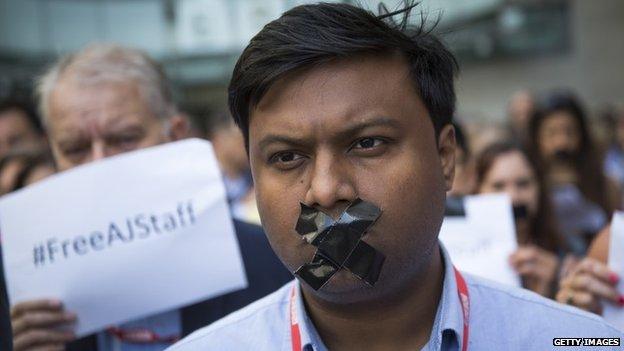 BBC staff and colleagues from other news organisations take part in a one-minute silent protest outside New Broadcasting House on 24 June 2014 in London, England