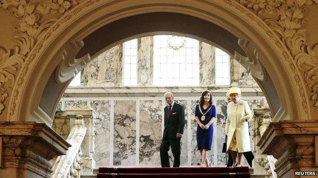 The Royal couple being shown around Belfast City Hall by Lord Mayor Nichola Mallon