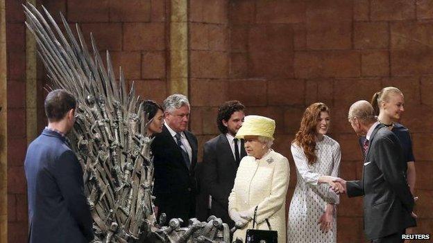 Queen looks at Iron Throne