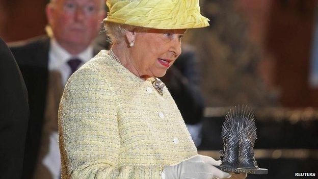 The Queen was presented with a miniature version of the Iron Throne