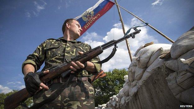 Pro-Russian separatist at checkpoint outside town of Lysychansk in Luhansk region of eastern Ukraine. 24 June 2014