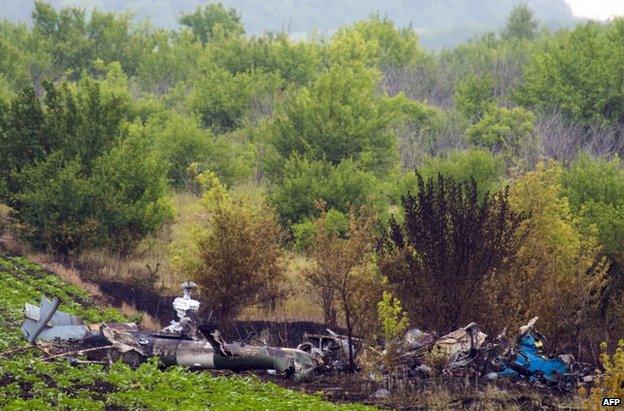 The wreckage of a Ukrainian helicopter downed near Sloviansk on 24 June