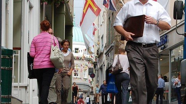 People walking in the High Street in St Peter Port