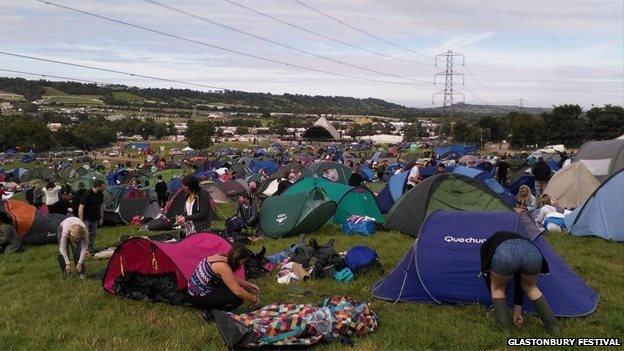 Glastonbury ticket-holders pitch their tents