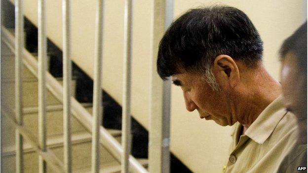 Sewol ferry captain Lee Joon-seok is escorted upon his arrival for his trial at the Gwangju District Court in the southwestern South Korean city of Gwangju on June 10, 2014