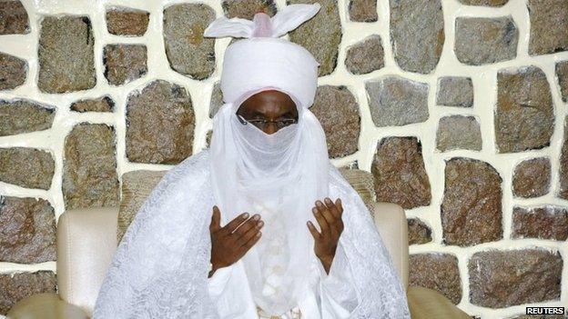 Lamido Sanusi, the new Emir of Kano, prays in Kano city on 10 June 2014