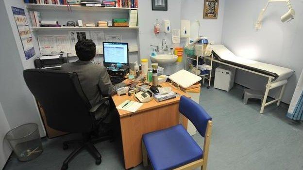 Doctor in consulting room