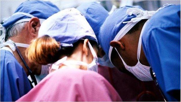 Surgeons in an operation