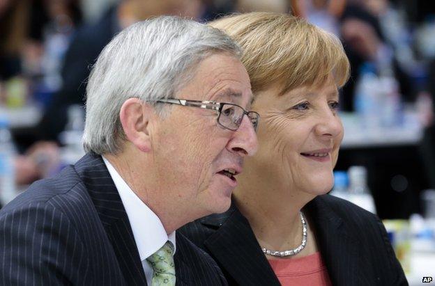 Jean-Claude Juncker with Angela Merkel in Berlin, 5 April