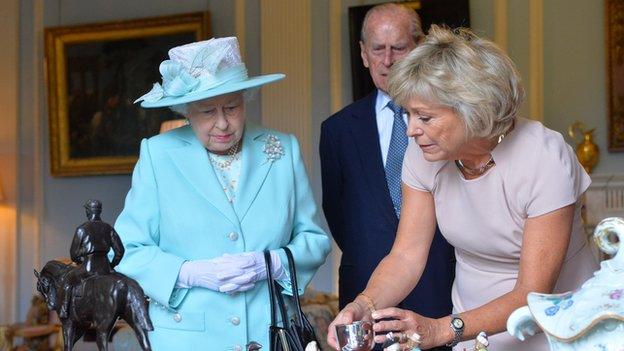 The Queen was shown items to be featured on the Antiques Roadshow filmed at Hillsborough