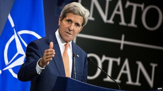 US Secretary of State John Kerry speaks during a press conference at NATO headquarters - 25 June 2014