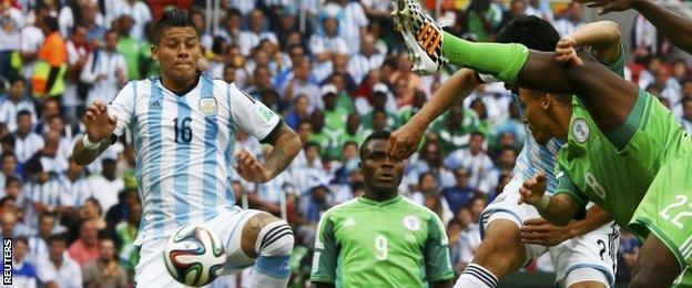 Argentina"s Marcos Rojo (left)