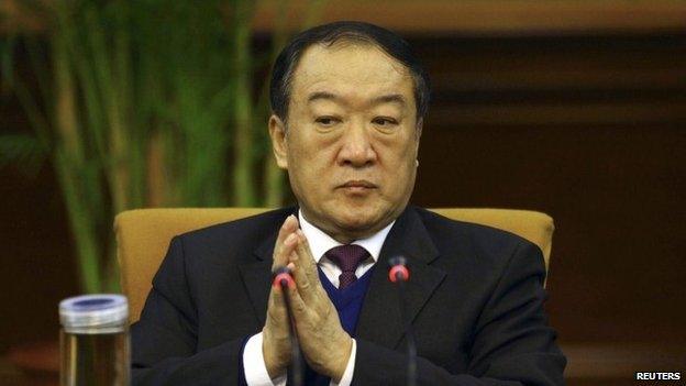 Then Communist Party Secretary of Jiangxi province, Su Rong attends a group discussion during the National People"s Congress in Beijing March 6, 2012.