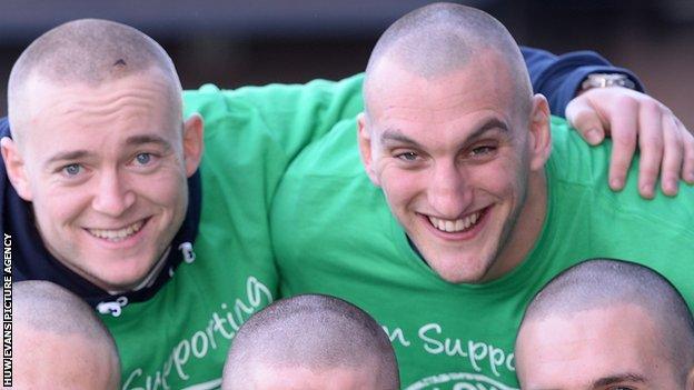 Owen Williams and Sam Warburton posing for picture after having their heads shaved for charity