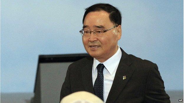 In this 25 June 2014 photo, South Korean Prime Minister Chung Hong-won arrives to attend a ceremony to mark the 64th anniversary of the outbreak of the Korean War in Seoul, South Korea.