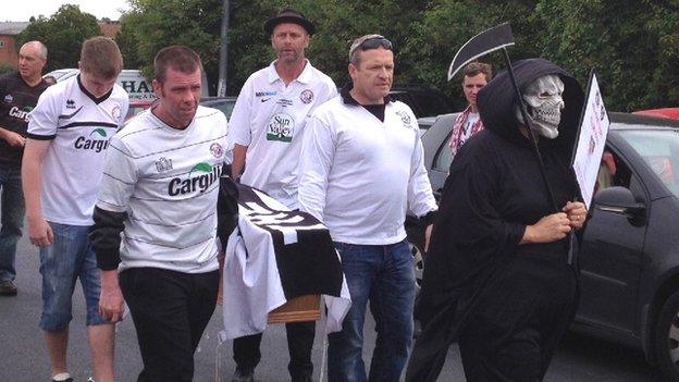 Protestors on the 'funeral' march