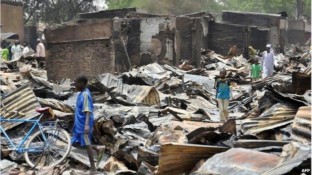 Shops burnt in a suspected Boko Haram attack in Gamboru Ngala district, Borno State, May 2014