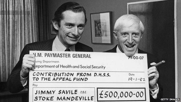 Jimmy Savile and a giant cheque