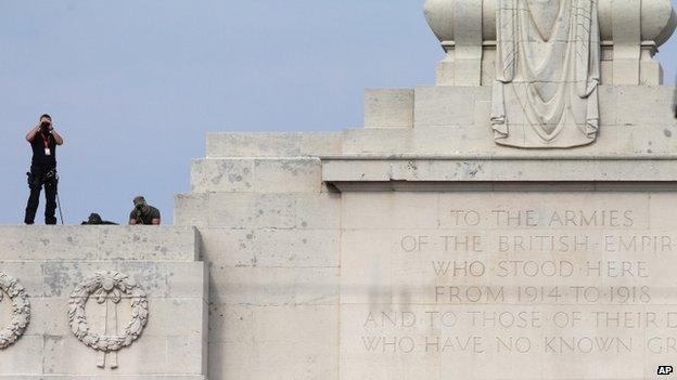 Snipers stand atop the Menin gate during a ceremony at an EU Summit meeting in Ypres, Belgium on 26 June 2014